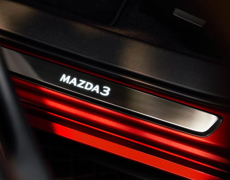 2026 Mazda3 Sedan Accessories – Illuminated Doorsill Trim Plates