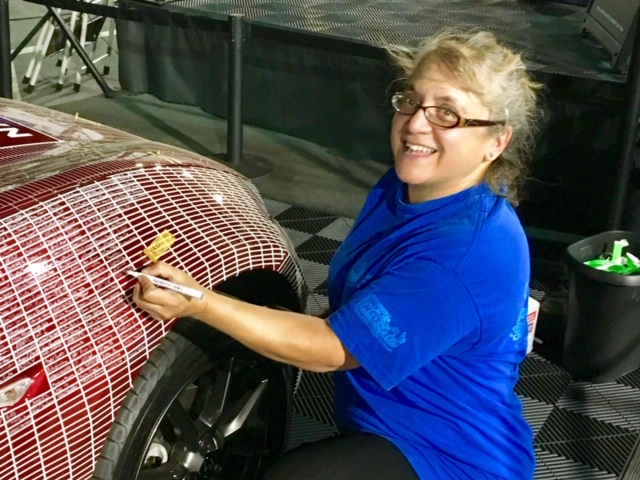 Rona Dexler Autographing a Mazda MX-5 Miata
