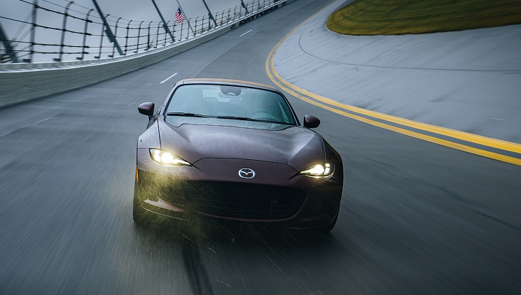 2025 Mazda MX-5 Miata 35th Anniversary Edition Driving on a Racetrack in the Rain