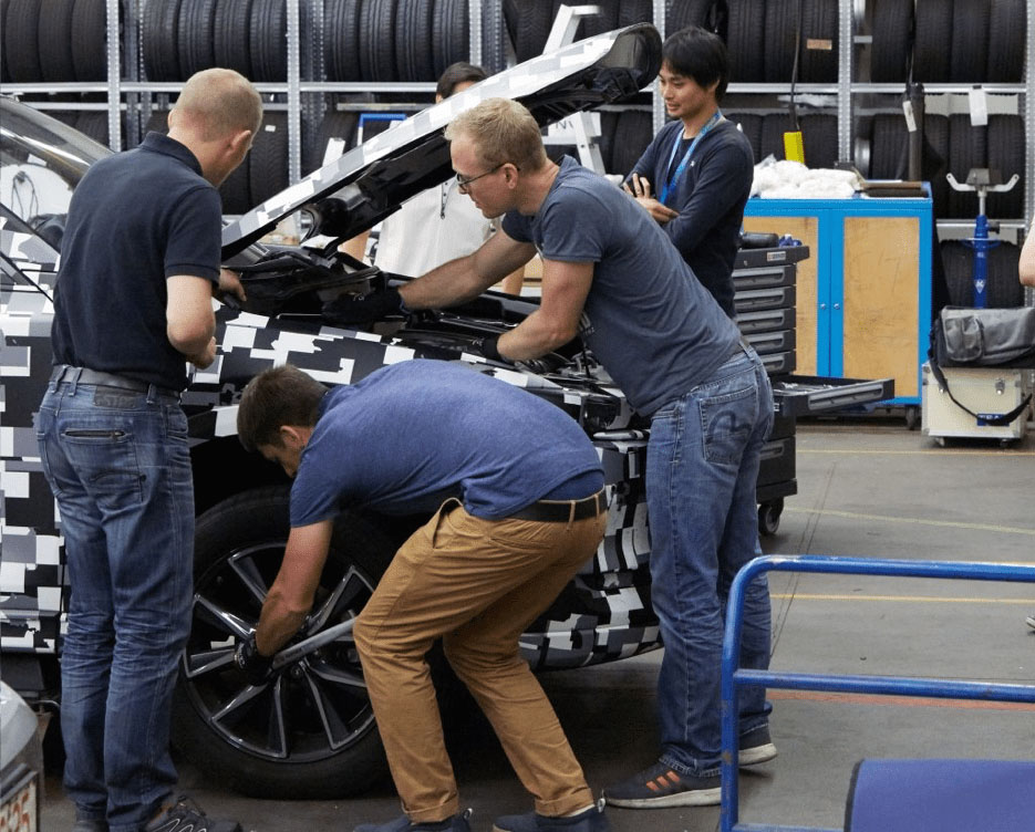 Engineer Dave Coleman and Team Working on the Mazda CX-5