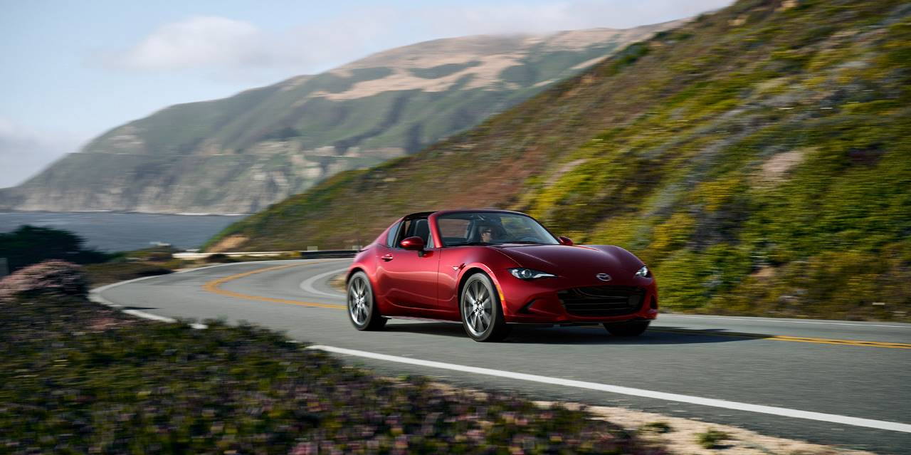 2024 Mazda MX-5 Miata RF driving on a road near Danbury, CT
